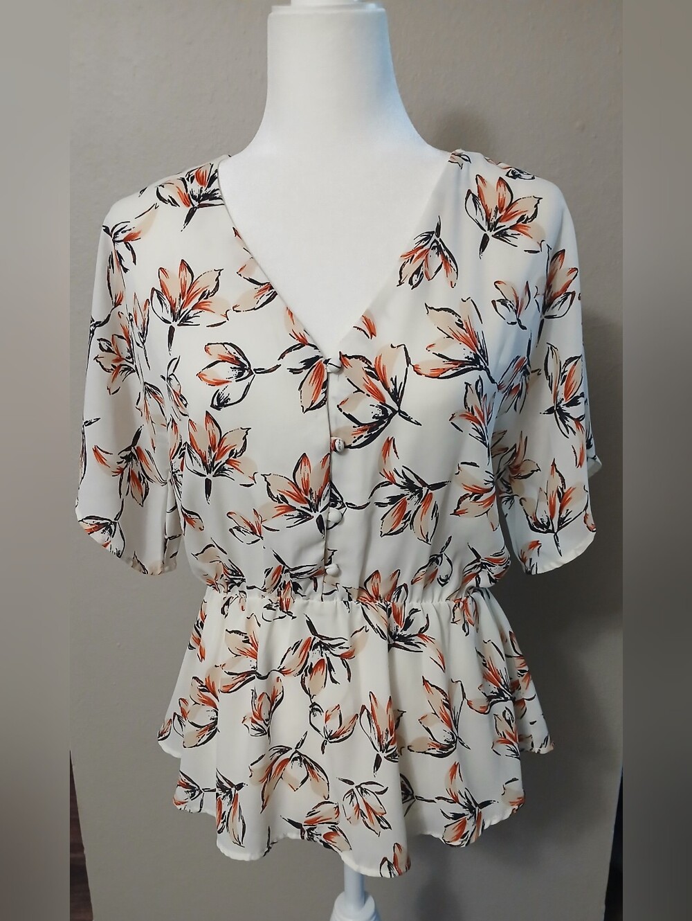 Sienna Sky White Floral V-Neck Peplum Top with Orange Print